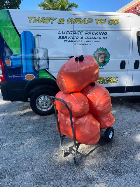 We wrap and weigh your luggage — 2